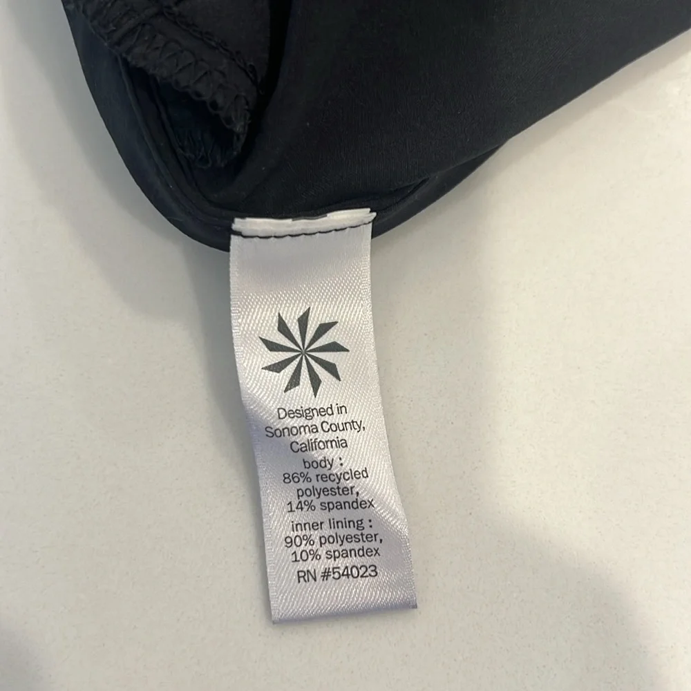 Black Athleta skort with side zipper pockets. - Picture 6 of 6